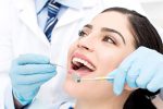 Female getting dental check up