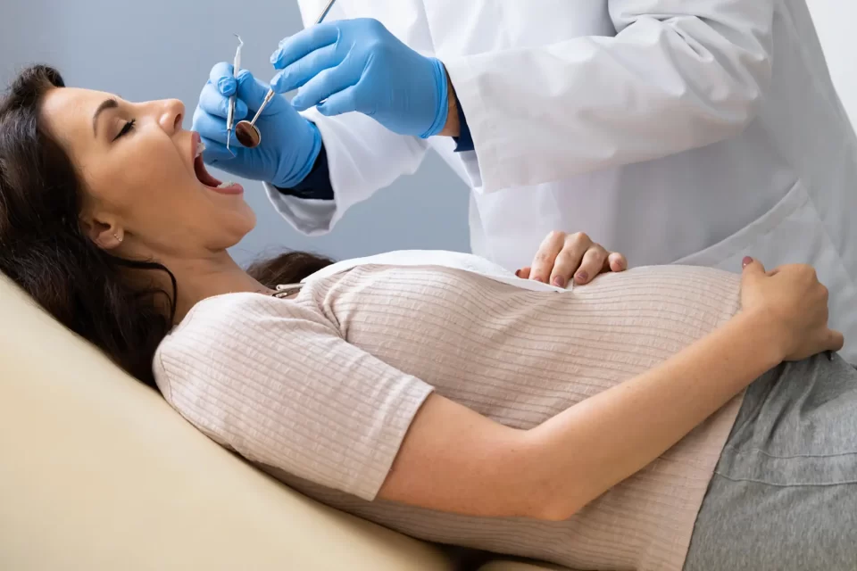Female getting dental check up